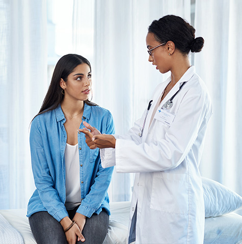 A young woman having a consultation with her doctor